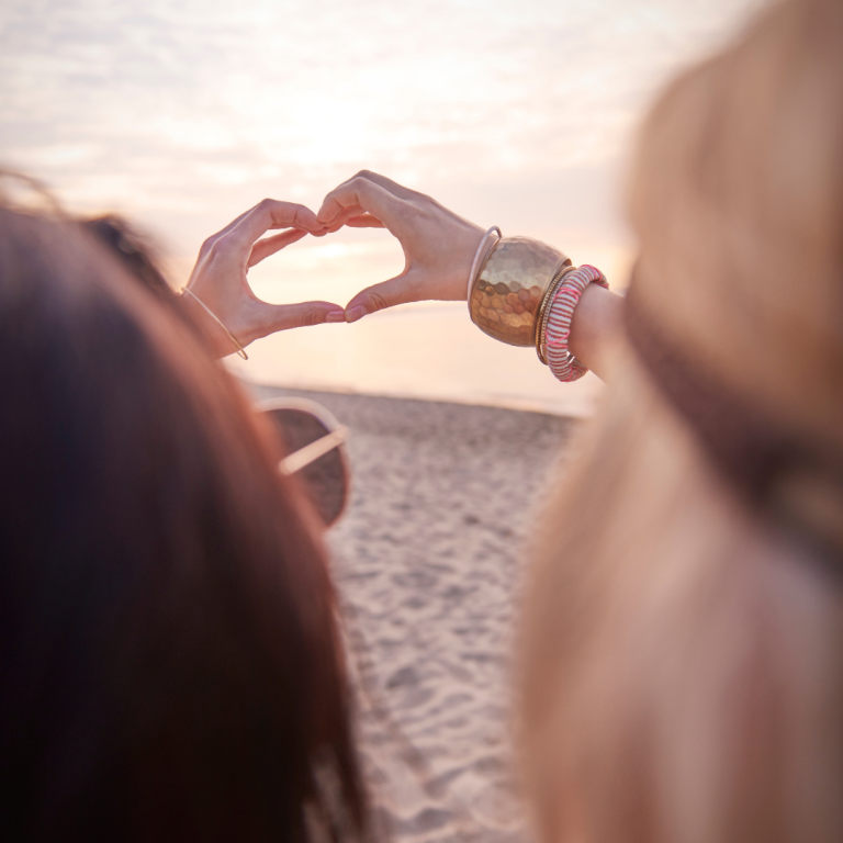 Two Best Friends Putting Their Hands Together like a Heart